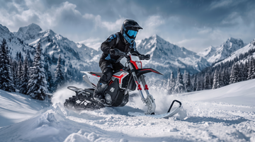 Honda snowbike riding in deep mountain snow
